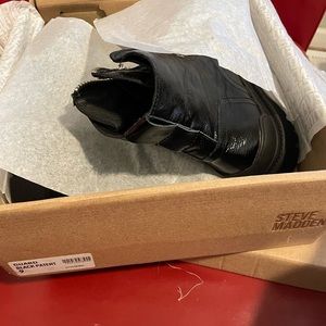 Brand new never worn beautiful patent leather boots.